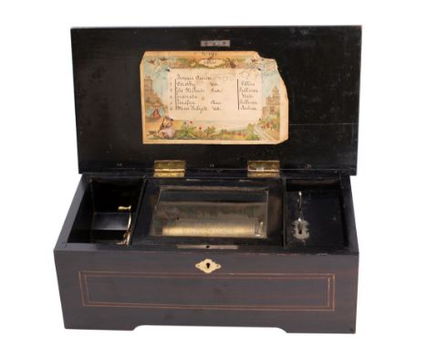 A late 19th century Swiss music box playing six airs, with 11.25cm cylinder having ratchet lever winding, paper song sheet, c