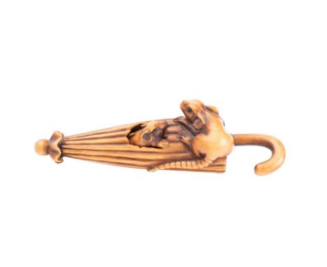 A Japanese boxwood netsuke of two rats, one emerging from an umbrella, unsigned, 9cm long. Meiji period.
