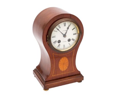 A German Edwardian balloon shaped mantel clock,  the eight-day duration movement striking the hours and half-hours on a gong 