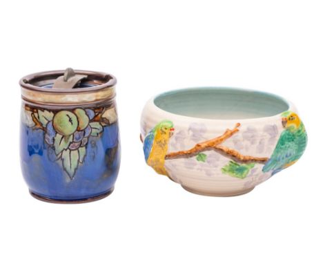 A Clarice Cliff bowl and a Royal Doulton tobacco jar, the former embossed in the Budgerigar pattern the latter incised with f