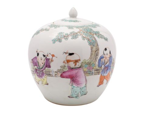 A Chinese famille rose 'boys' oviform jar and cover enamelled with three boys playing in a garden, 24cm.