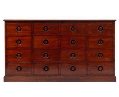 A mahogany haberdasher's or draper's chest of drawers, second quarter 19th century; the top with ovolo moulded edges; above f