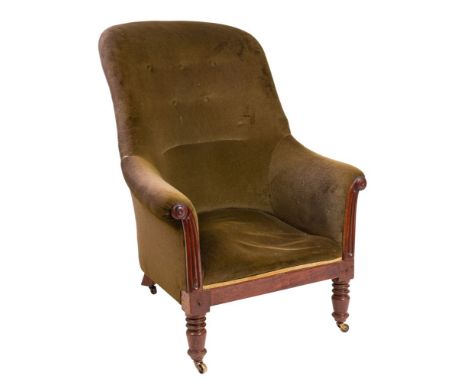 A Regency mahogany and button upholstered library armchair, early 19th century; with later green velvet coverings; the arched