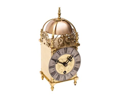 A small reproduction brass lantern clock,  the eight-day duration timepiece movement with passing strike having a platform le