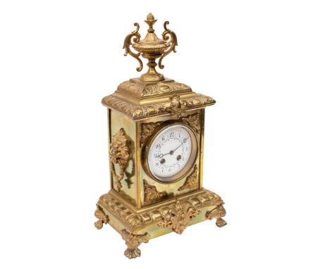 S. Marti, Paris, a decorative brass mantel clock,  the eight-day duration movement striking the hours and half-hours on a bel