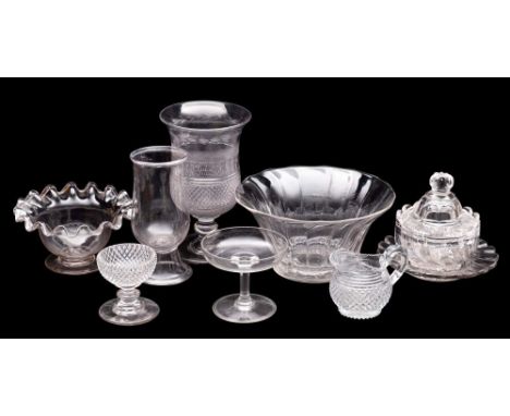 A mixed group of glassware comprising a wrythen lobed and cut confiture, cover and stand, a footed bowl with crimped fold ove