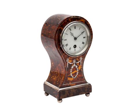 An Edwardian tortoiseshell and silver inlaid clock,  the eight-day duration timepiece movement having a platform lever escape