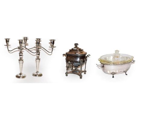 A Victorian silver plated samovar, pair of three-light silver plated candelabra, together with a serving dish with glass line