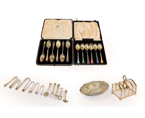 A tray of silver items including a cased set of six Elizabeth II harlequin enamelled demitasse spoons, by Turner and Simpson 