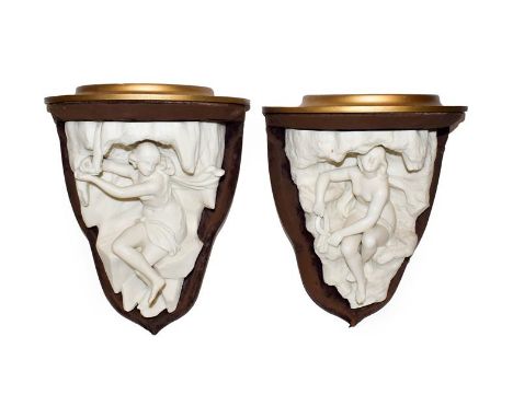 A pair of Royal Worcester Parian mounted wall brackets, from a set of four allegorical of the four seasons, 32cm.  The figure