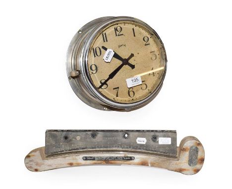 A chrome plated ships bulkhead timepiece, signed Smith, 26cm diameter, together with a clinometer, 57cm  23.02.21  Clock and 