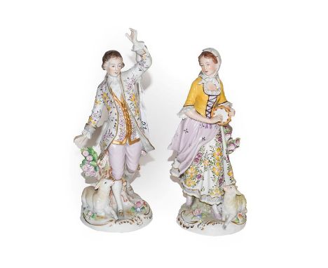 A pair of Sitzendorf figures, Shepherd and Shepherdess, blue printed marks, 26cm high.  Good condition. No damage or repair. 