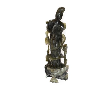 A Chinese 20th century jadeite statue of Guanyin, 33cm high 