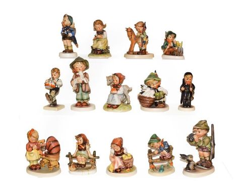A tray of fourteen Hummel figures .  Three figures damaged the remainder in generally good condition