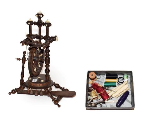 A 19th century apprentice made miniature spinning wheel with bone mounts 34cm, together with a quantity of assorted sewing to