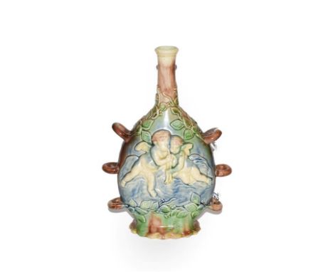 A majolica pottery flask, decorated in relief with cherubs and leaves, 24.5cm