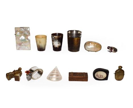 A tray of collectables including Scottish horn beakers, babies rattle, mother of pearl card case, vesta cases, miniature midd