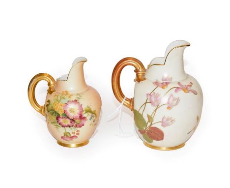 Two Royal Worcester blush ivory jugs, both painted with flowers, both model 1094, tallest 17cm high.  Both in good condition