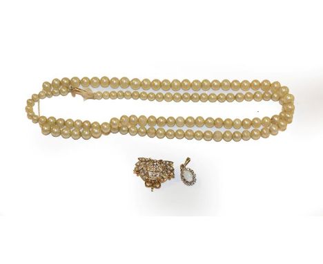 A cultured pearl necklace, clasp stamped '9CT', length 59cm; a 9 carat gold split pearl crown and anchor brooch, length 2.0cm