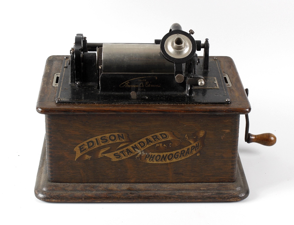 A Thomas Edison phonograph with single cylinder, in wooden case with ...