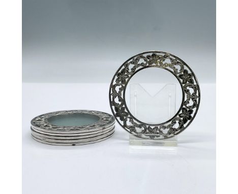 This 6 piece set features a lovely sterling floral pattern around the perimeter of each coaster. Each measures 3" dia. Total 