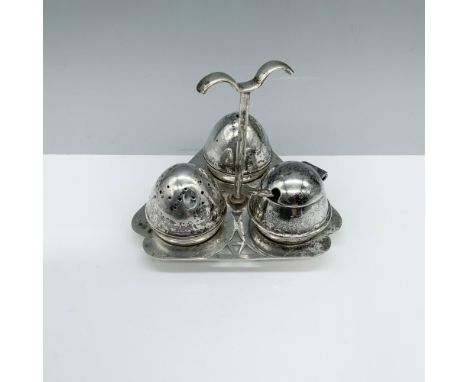 Charming silver plated caddy with an egg shaped salt shaker, egg shaped pepper shaker, and egg shaped sugar holder with spoon