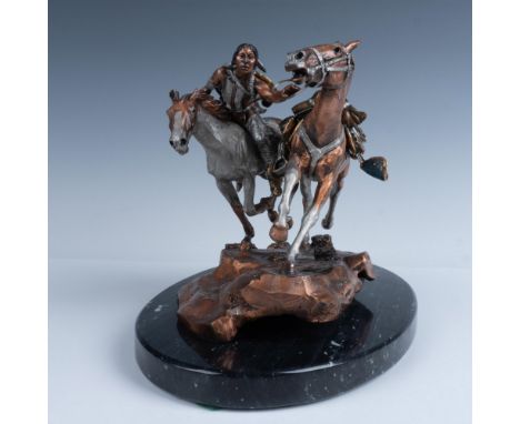 This pewter and bronze figurine depicts a rider capturing a runaway horse. Crafted using a blend of fine metals, including lo