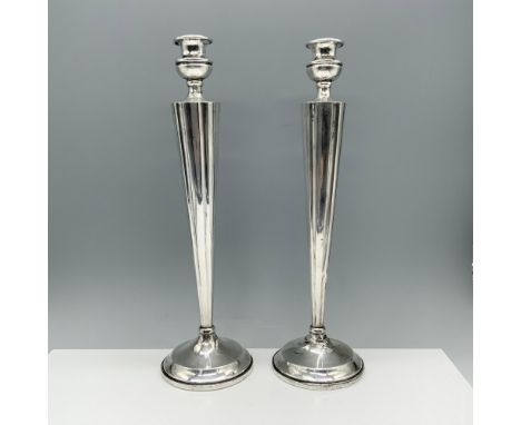 Lovely duo of sterling silver candlestick displays reinforced with an inner rod. Sterling backstamp on both items. Issued: 20