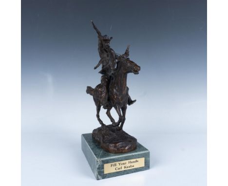 A striking bronze sculpture depicts a cowboy firing his guns while riding atop his trusty steed. Marked Fill Your Hands. Mark