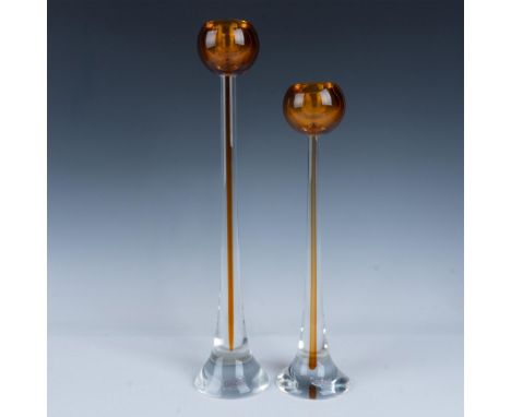 Clear cased glass stem holders with amber globe holder. Pair includes pillars measuring 17"H and 14"H. Oggetti Italy tag. Iss