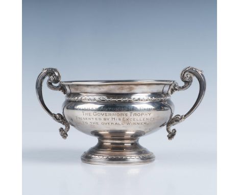 A vintage footed vessel featuring fish and leaf scroll handles. Adie Bros Ltd, Anchor, Lion, J (1958) hallmarks. Total weight