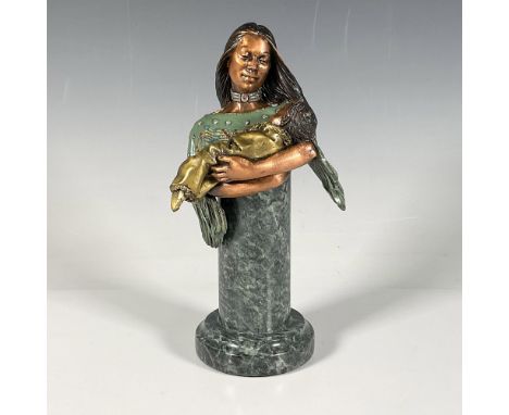 This limited edition bronze figurine by artist Christopher Pardell depicts a Native American woman cradling a swaddled baby. 