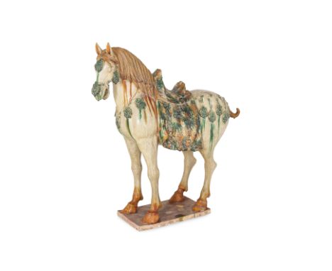 A VERY LARGE AND IMPRESSIVE SANCAI MODEL OF A HORSE
Well modelled standing on all fours, wearing mottled yellow-green saddle 