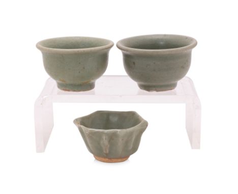 A GROUP OF THREE LONGQUAN CELADON TEA BOWLS
Yuan-Ming dynasty, two examples of a similar type with everted mouth rim, glazed 