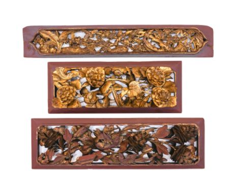 THREE CARVED GILTWOOD PANELS
Late 19th/early 20th century, each well carved in high relief, one with a phoenix amongst peonie