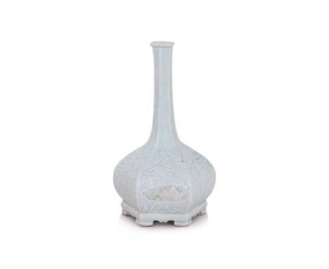 A KOREAN HEXAGONAL MOULDED WHITE GLAZED PORCELAIN BOTTLE VASE
Joseon dynasty, 18th/19th century, vase with hexagonal faceted 