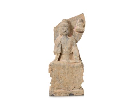 A LARGE CARVED STONE FIGURE OF BUDDHA SEATED
Modelled seated with right palm raised in abhaya mudra, partial nimbus to rear, 