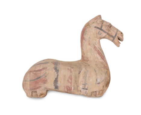 A LARGE PAINTED POTTERY MODEL OF A HORSE
Modelled as torso with painted red and black features, possibly Han dynasty
50cm lon