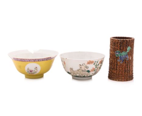 TWO PORCELAIN BOWLS AND A BRUSH POT A famille rose bowl decorated with rams and trees, Daoguang mark to base (but likely Guan