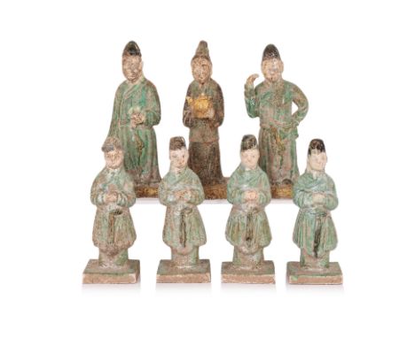 A GROUP OF SEVEN SANCAI-GLAZED STANDING FIGURES
Ming dynasty, four examples of a similar form male figure wearing green robe 