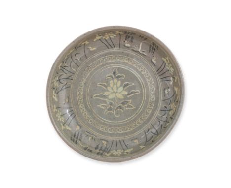 A KOREAN INLAID CELADON SHALLOW DISH
Koryo dynasty style and possibly of the period, the rounded sides with slightly everted 