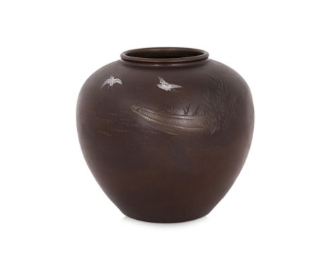 A JAPANESE SILVER INLAID BRONZE VASE
Meiji, circa 1900, spherical body decorated to one side with two birds flying above a bo