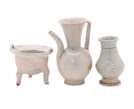A GROUP OF THREE QINGBAI WARES
Song-Yuan dynasty, a globular tripod censer with everted rim and loop lugs, a lobed ewer with 