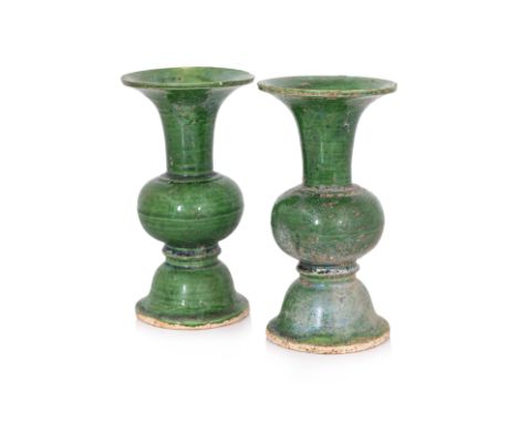 TWO SMALL GREEN-GLAZED 'GU' FORM VASES
Standing on bell-shaped foot and trumpet neck, covered in apple-green glaze with some 