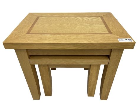 Light oak nest of two tablesDimensions: Height:&nbsp;50cm&nbsp; Length/Width:&nbsp;59cm&nbsp; Depth/Diameter:&nbsp;42cm