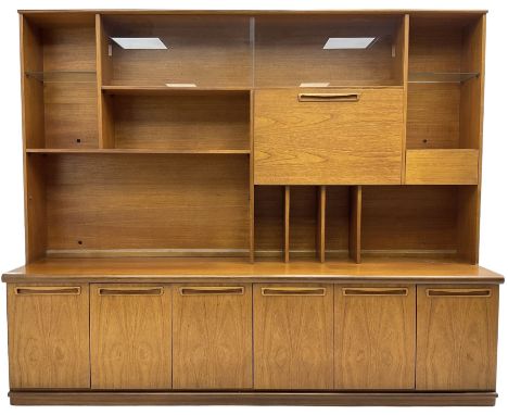 Mid-20th century teak bookcase wall unit (W201cm, H166cm, D46cm); similar teak corner shelf (H191cm, W63cm)Dimensions: Height