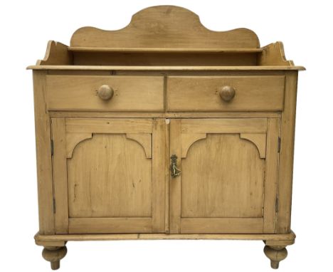 Victorian polished pine washstand side cabinet, raised back with shelf, fitted with two drawers over panelled cupboard, on tu