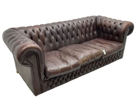 Three-seat Chesterfield sofa, upholstered in buttoned brown leather Dimensions: Height:&nbsp;74cm&nbsp; Length/Width:&nbsp;21