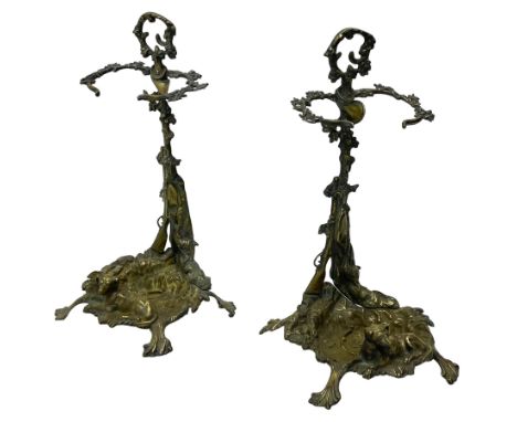 Pair of cast brass hallway umbrella or stick stands, in the form of a tree decorated with trailing flowering foliage branches