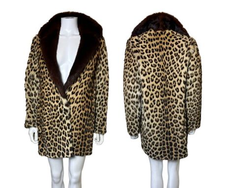 A vintage 1960s leopard skin jacket with chocolate mink collar. Unlabelled with a shot claret satin lining, inner swing tie a